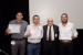 Dr. Nagib Callaos, General Chair, giving Prof. Horderlin V. Robles, Prof. Valentín Molina and Prof. Edwar Bejarano and the best paper award certificate of the session "Sistemas/Tecnologías de Comunicaciones y Procesamiento de Imágenes/Señales ." The title of the awarded paper is "Segmentación de los Pulmones Usando Máquinas de Soporte Vectorial en Imágenes de Tomografía Computarizada."